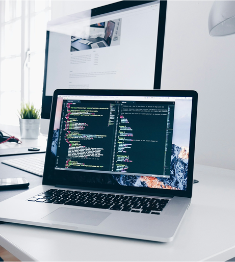 Laptop and phone on desk